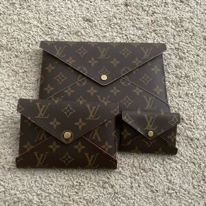 Gently used Authentic Louis Vuitton kirigami 3 piece set. With inserts and chain